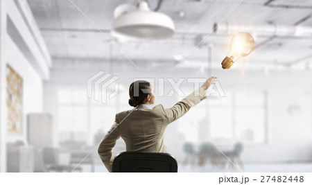 Lady boss in office chair 27482448