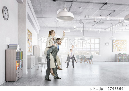 Businesspeople having fun in office 27483644