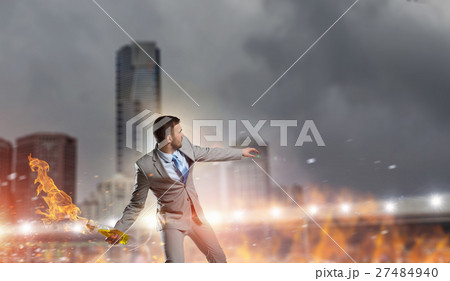 Businessman throwing petrol bomb 27484940