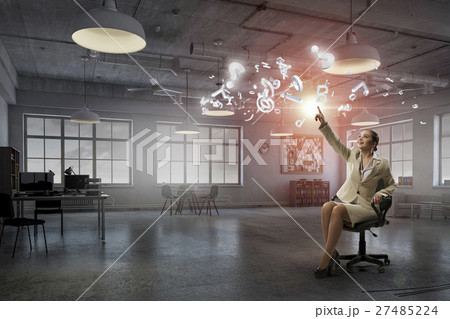 Lady boss in office chair 27485224