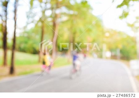Blurred background of people activities in park 27486572