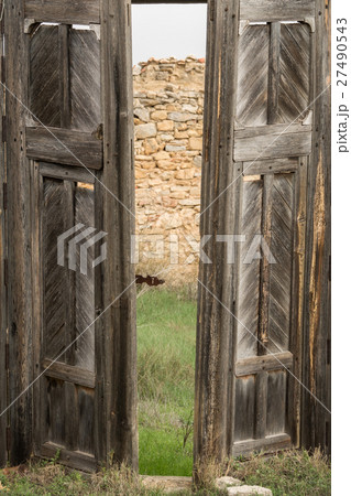 Old abandoned wooden door Old abandoned wooden door 27490543