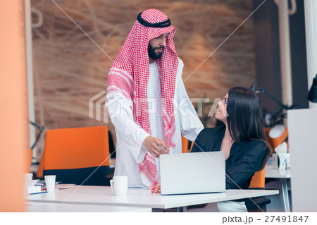 Multi ethnic business people at work in modern 27491847