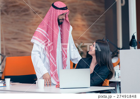 Multi ethnic business people at work in modern 27491848