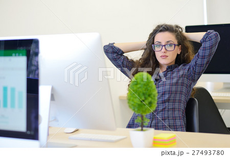 businesswoman resting at work. modern startup businesswoman resting at work. modern startup 27493780