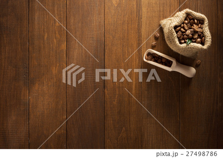 coffee beans in bag on wood coffee beans in bag on wood 27498786