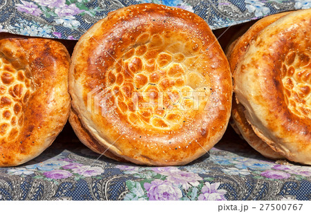 Traditional uzbek flatbread with sesame seeds Traditional uzbek flatbread with sesame seeds 27500767