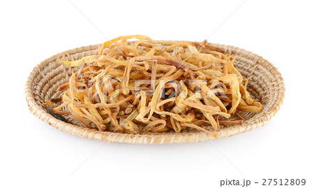 Dried Day Lily in basket on white background 27512809