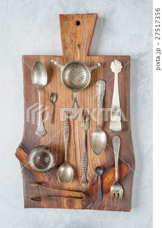 Tableware on a cutting board Tableware on a cutting board 27517356