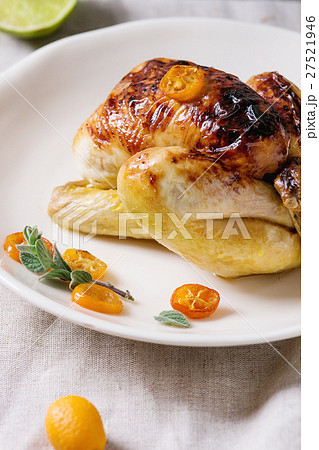Fried chicken with kumquats 27521946