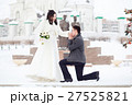 Guy asks the girl hands. Winter wedding, groom on 27525821