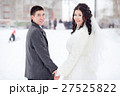 Winter wedding, bride and groom holding hands 27525822