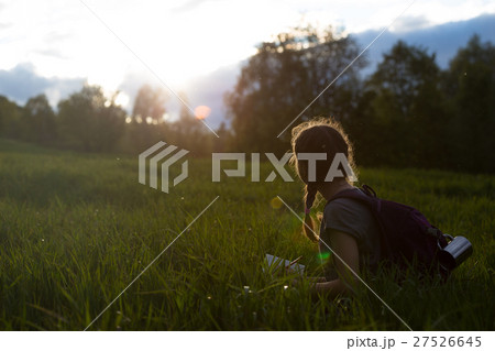 girl hiker on a meadow 27526645