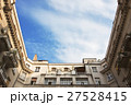 Old building exterior with sky in the middle 27528415