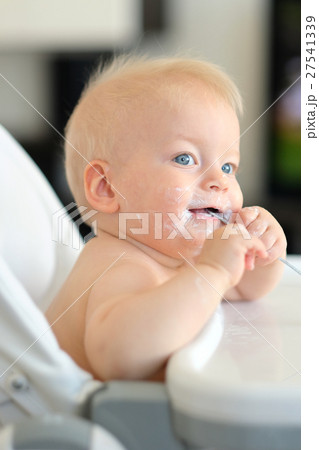 Feeding baby with spoon 27541339