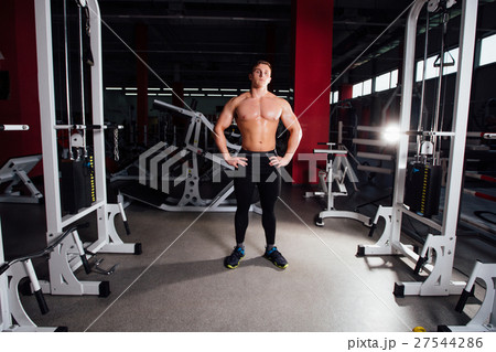 portrait of strong professional bodybuilder stand portrait of strong professional bodybuilder stand 27544286