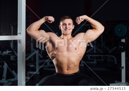 professional fitness bodybuilder sitting on the professional fitness bodybuilder sitting on the 27544515