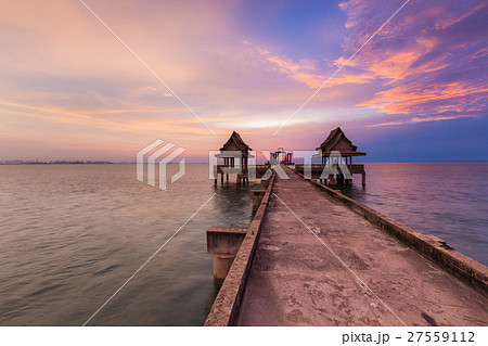 Beautiful sunset over walking way Beautiful sunset over walking way 27559112