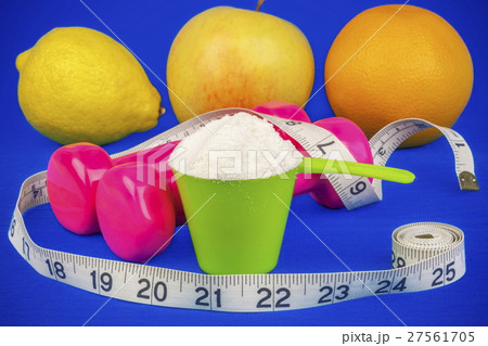 Dumbbells with tape measure,whey powder and fruits Dumbbells with tape measure,whey powder and fruits 27561705