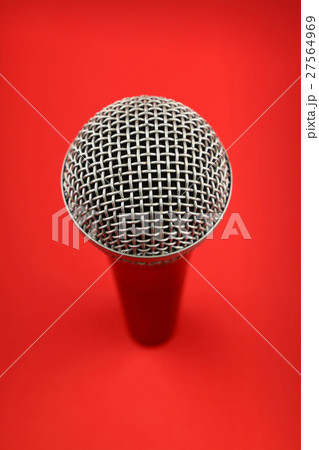 Microphone high angle close up over red Microphone high angle close up over red 27564969
