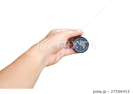 hand of a man holding a compass on white background. 27566453