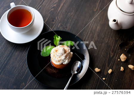 Tea and sweet cake 27576394