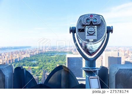 Binocular against observation deck view. 27578174