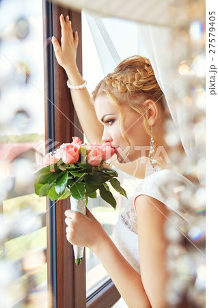 portrait of  bride near the window 27579405