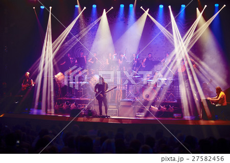 Guitarist performing on stage. Concert. 27582456