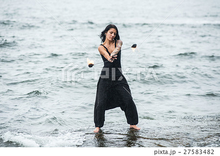 fire show on the shore of the sea fire show on the shore of the sea 27583482