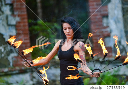 fire show on the shore of the sea 27583549