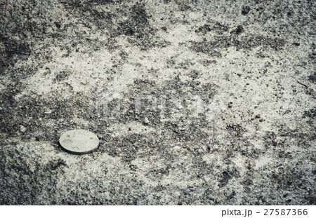 old coin on ground 27587366