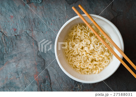 Soup Ramen noodles in bowl and bamboo sticks Soup Ramen noodles in bowl and bamboo sticks 27588031