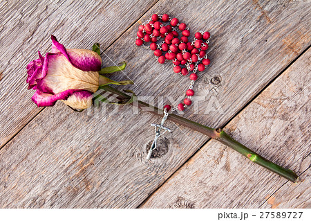 Silver crucifix and old rose Silver crucifix and old rose 27589727
