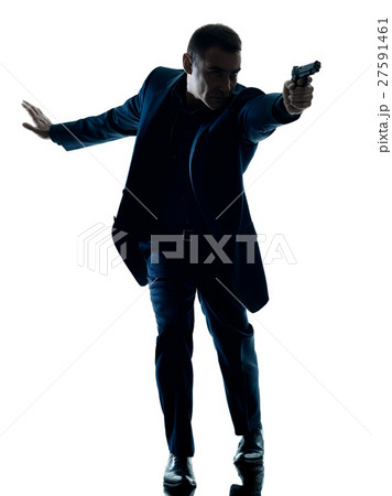 man with a handgun silhouette isolated 27591461
