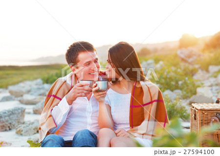 Young happy couple in love at the summer picnic 27594100