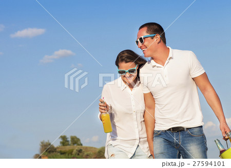 Young happy couple in love at the summer picnic 27594101