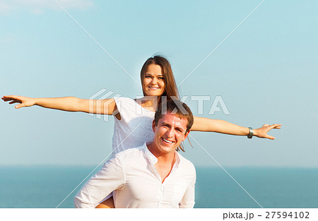 Young happy couple in love Young happy couple in love 27594102