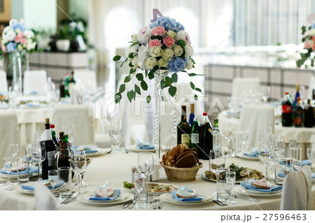 Bouquet of blue, pink and white roses stands Bouquet of blue, pink and white roses stands 27596463