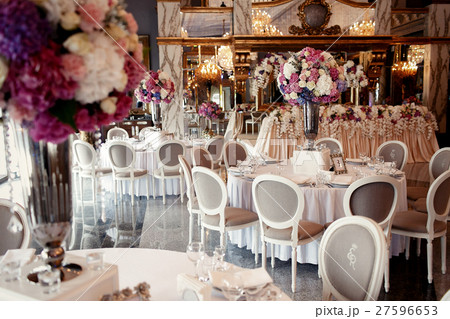 Large pink bouquet of hydrangeas and roses stands  27596653