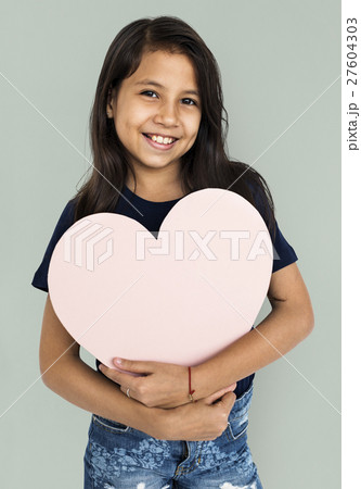 Little Girl Carrying Heart Concept 27604303