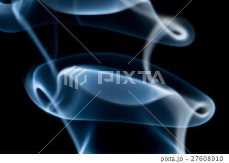 Blue smoke curls on a black background 27608910