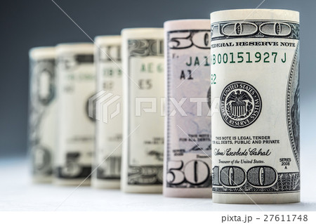 Dollar. Dollar banknotes roll in other positions. Dollar. Dollar banknotes roll in other positions. 27611748