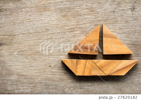 Tangram puzzle in sail boat shape  27620182