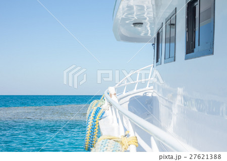 white yacht moving forward 27621388