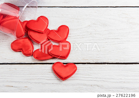 Red hearts on a white wood background 27622196