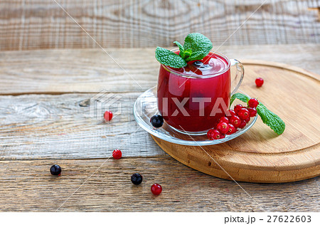 Berry jelly(kissel) in glass cup and mint. Berry jelly(kissel) in glass cup and mint. 27622603