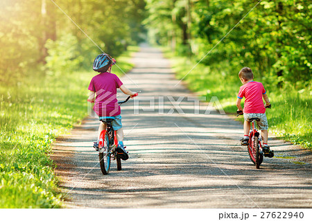 child on a bicycle child on a bicycle 27622940