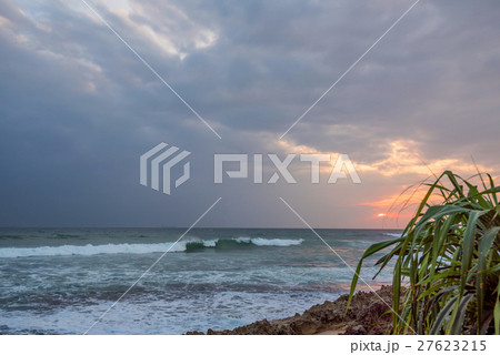 Sunset on tropical coastline 27623215