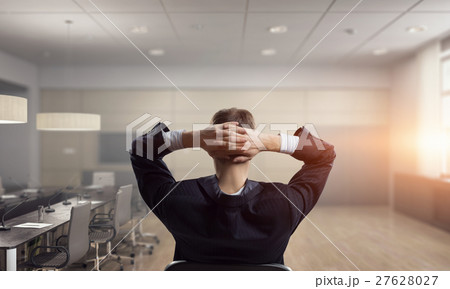 Businessman in chair having rest 27628027
